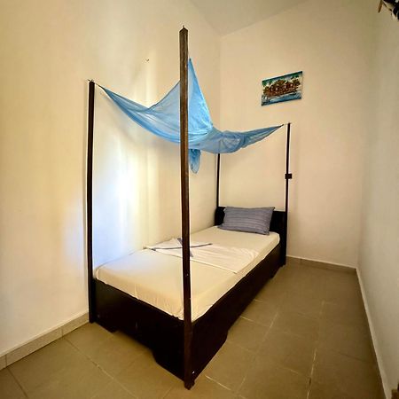 Guesthouse Cocotiers Котону Экстерьер фото