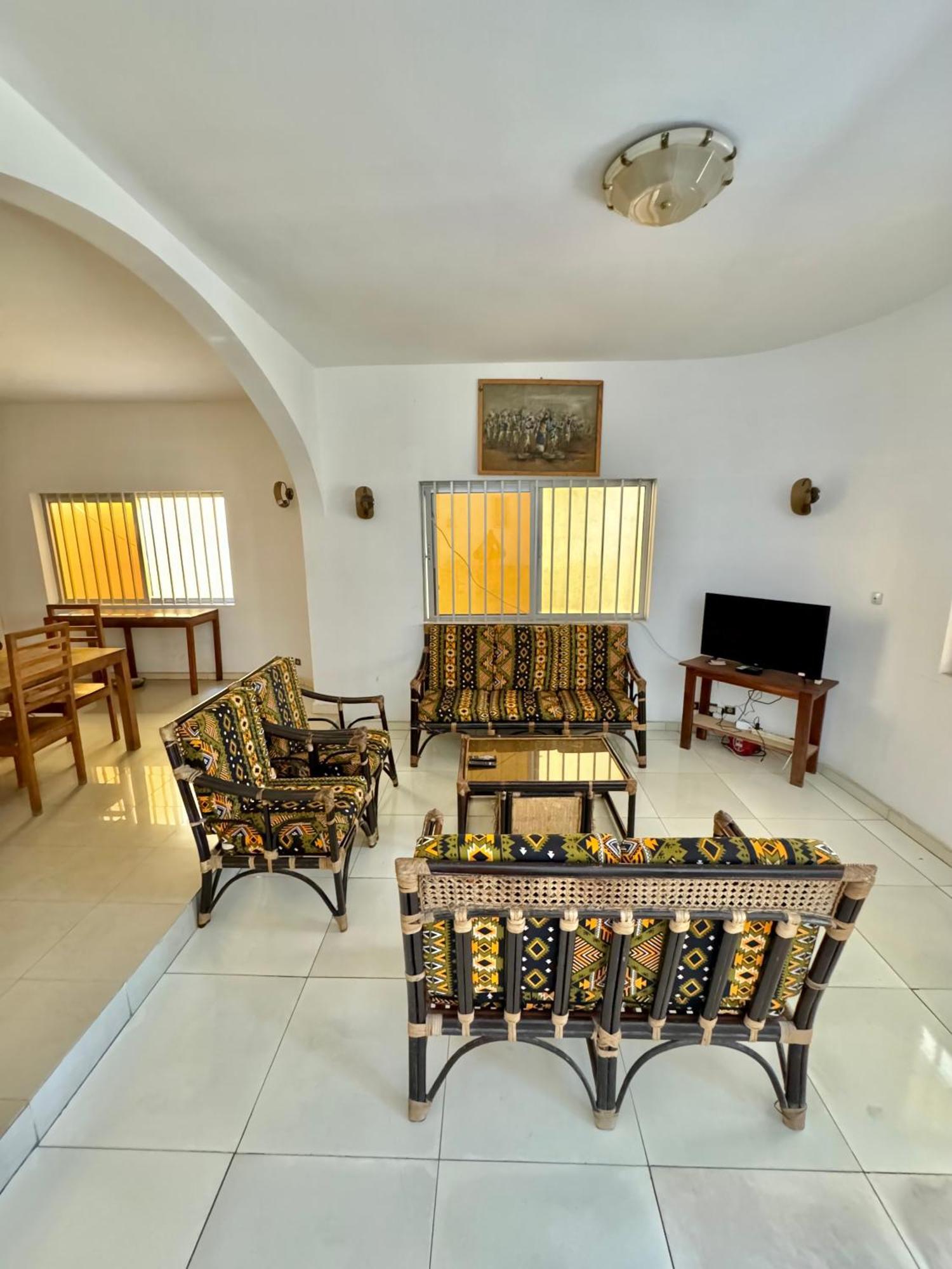 Guesthouse Cocotiers Котону Экстерьер фото