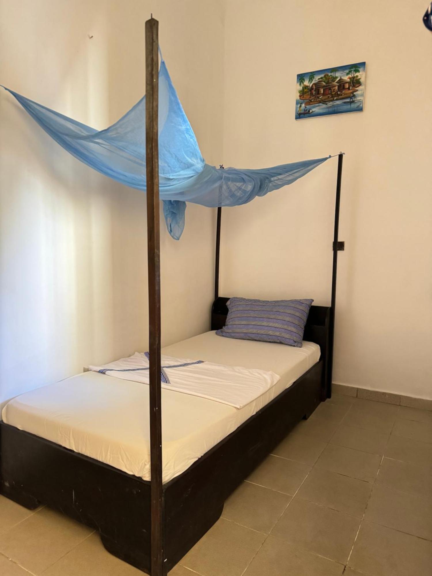 Guesthouse Cocotiers Котону Экстерьер фото