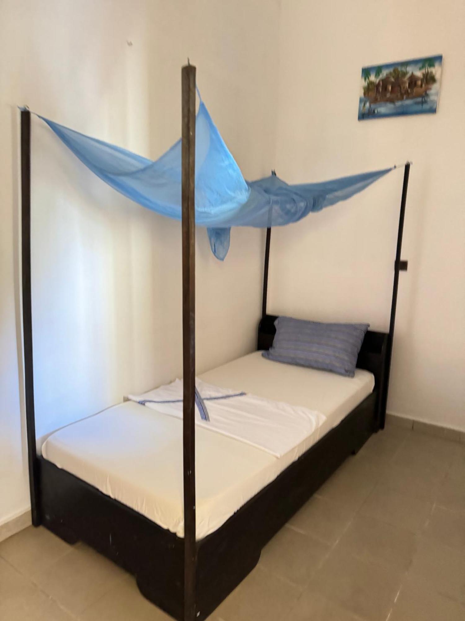 Guesthouse Cocotiers Котону Экстерьер фото
