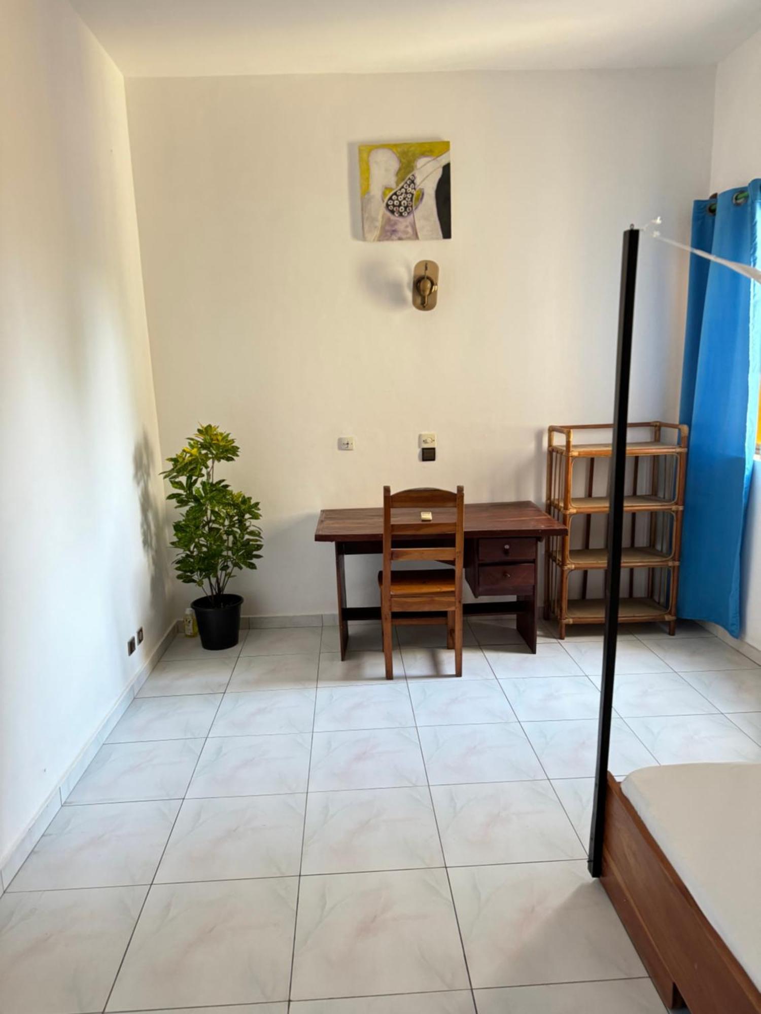 Guesthouse Cocotiers Котону Экстерьер фото